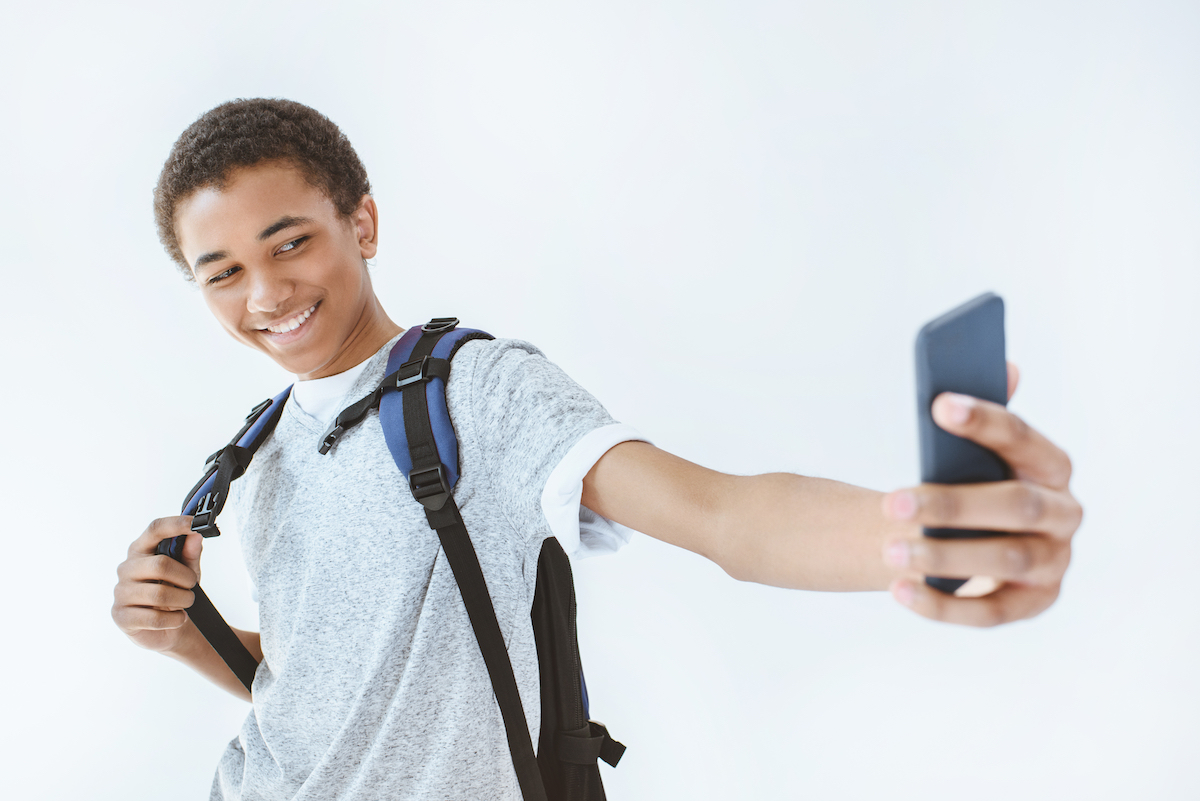 Photo of An African American Teen Taking A Selfie at The Regeneration Project Photo of An African American Teen Taking A Selfie at The Regeneration Project